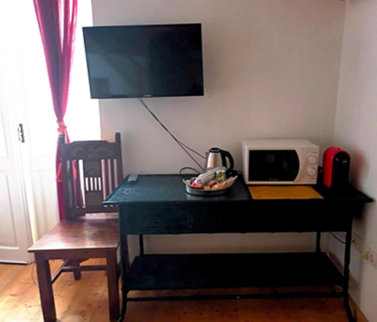 B&B Le Finestre Su Via Cavour ซัสซารี ห้อง รูปภาพ